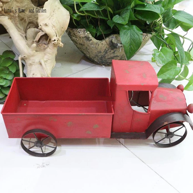 

handcrafted funny metal antique red car shaped flower planters