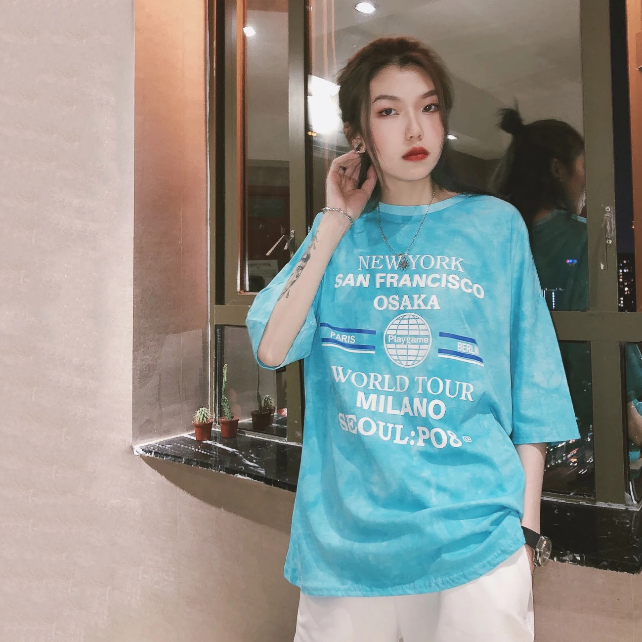girl wearing men's t shirt