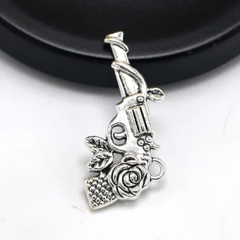 

50pcs Exquisit Double-sided rose pistol charm 30*17*4.5mm notebook bag Antique silver craft Jewelry earring bracelet necklace