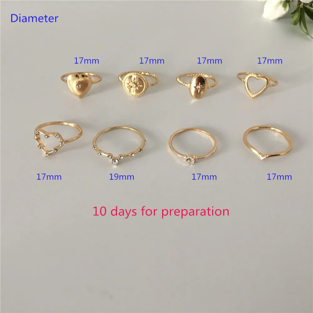 

TRENDY GOLD COLOR PLATING HEART STAR SHAPE CLEAR STONE 8 PCS WOMEN RING SET