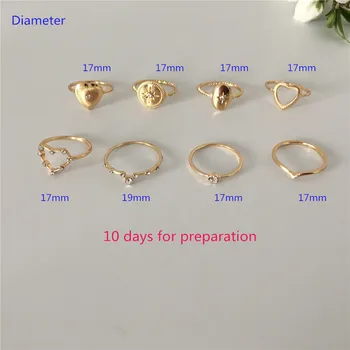 

TRENDY GOLD COLOR PLATING HEART STAR SHAPE CLEAR STONE 8 PCS WOMEN RING SET