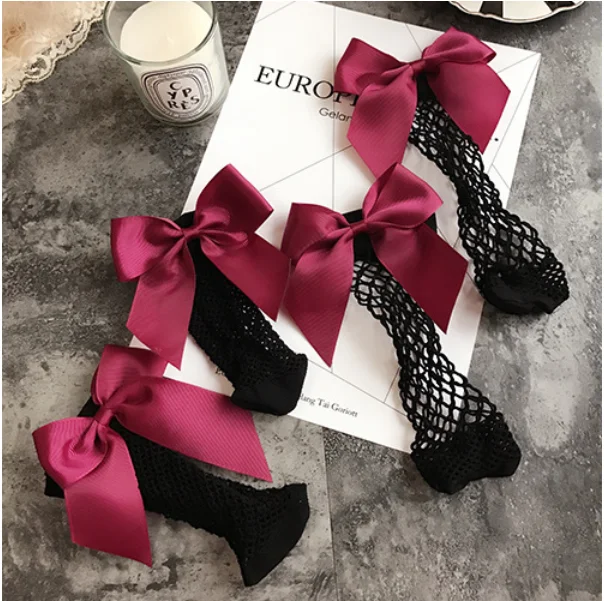 

New Fashion Hollow Out low Socks Popular Chic Thin Bow Fishnet Sock with bowknot Women Punk Cool Female Mesh Short Socks Females