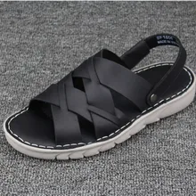 Импортные товары сандалии корейской тенденция коровьей сандалии с открытым носком Новая мужская кожаная двойного назначения пляжная обувь
