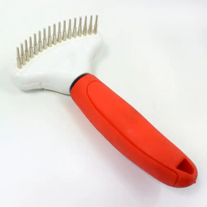 dog comb with rotating teeth