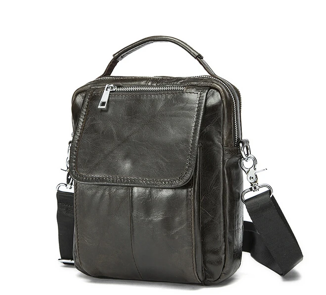 

The first layer cowhide single shoulder bag zipper inclined shoulder bag vertical free shipping