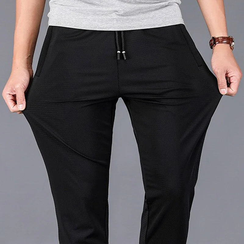 

Summer new casual pants men Drawstring Elastic Waist Lightweight skinny Straight grid mesh quick-drying Hollow mens trousers