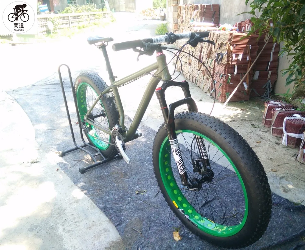 Flash Deal Kalosse   Snow  bicycle ,M390   air fork  26*4.0 tires  Hydraulic brakes  27 speed , beach mountain   bike 1