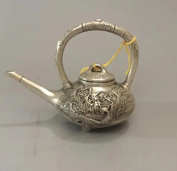 

Collectible archaize white copper dragon phoenix teapot