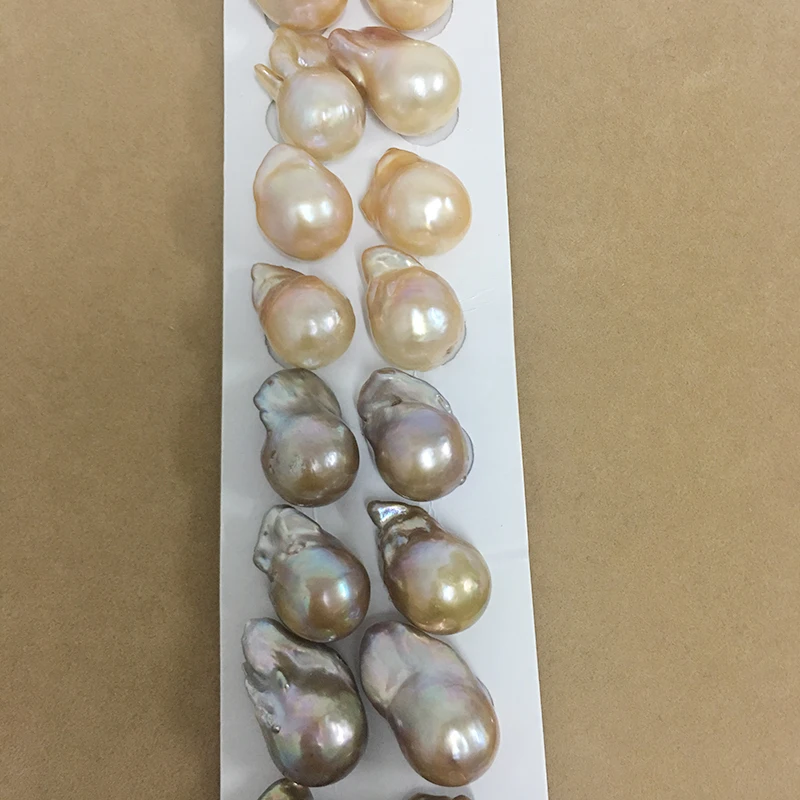 

High quality in earring paired pearl beads,KESHI PEARL,baroque pearl ,100% nature freshwater baroque pearl.half drilled hole