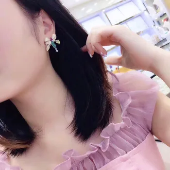 

Qi Xuan_Jewelry_New Earrings Bowknot Earrings S925 Silver Inlay Zircon Elegant And Irregular Irregular_Factory Direct Sales