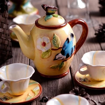 

Ceramic tea set creative relief teapot tea cup coffee cup saucer whole set of birthday Christmas gifts