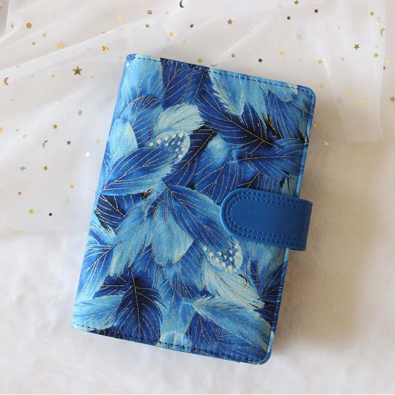 

The Blue World Creative Spiral Diary Cover A5 217*175mm Top Cloth Material+PU Leather Suit For Stnadard 6 Holes Refilled Paper