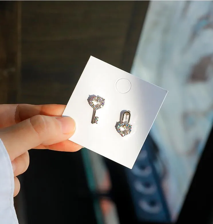 

a223 S925 silver needle fashion personality simple selection asymmetric mini key lock heart earrings