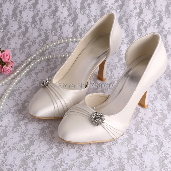 ivory round toe pumps