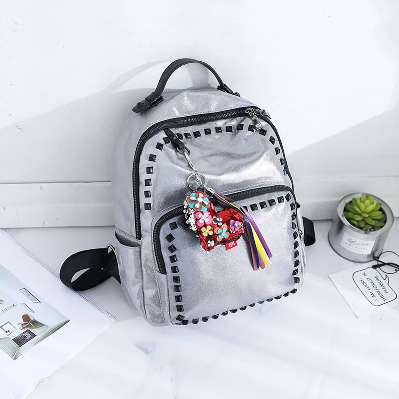 

Korean version rivets double shoulder bag PU mini leisure knapsack Japanese and Korean fashion institute wind willow nail book