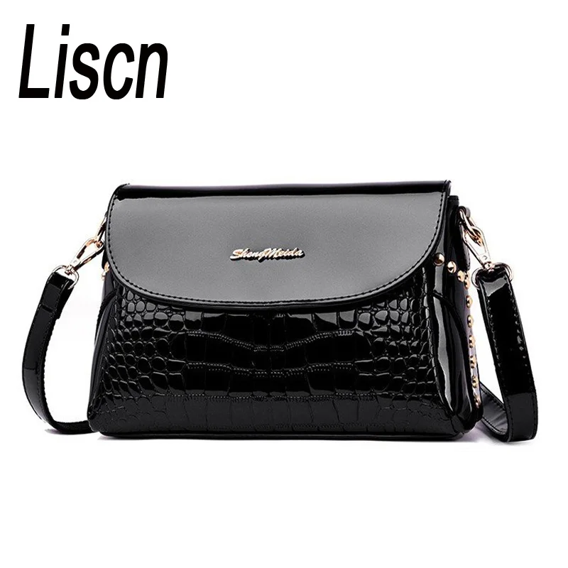 

Women's fashion rivets crocodile pattern patent leather small square bag 2019 new spring and summer trend single shoulder Messen