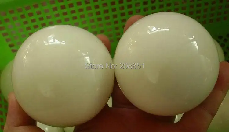 

2 NATURAL WHITE JASPER SPHERES GLOW GREEN IN THE DARK CRYSTAL BALLS HEALING.Free Shipping