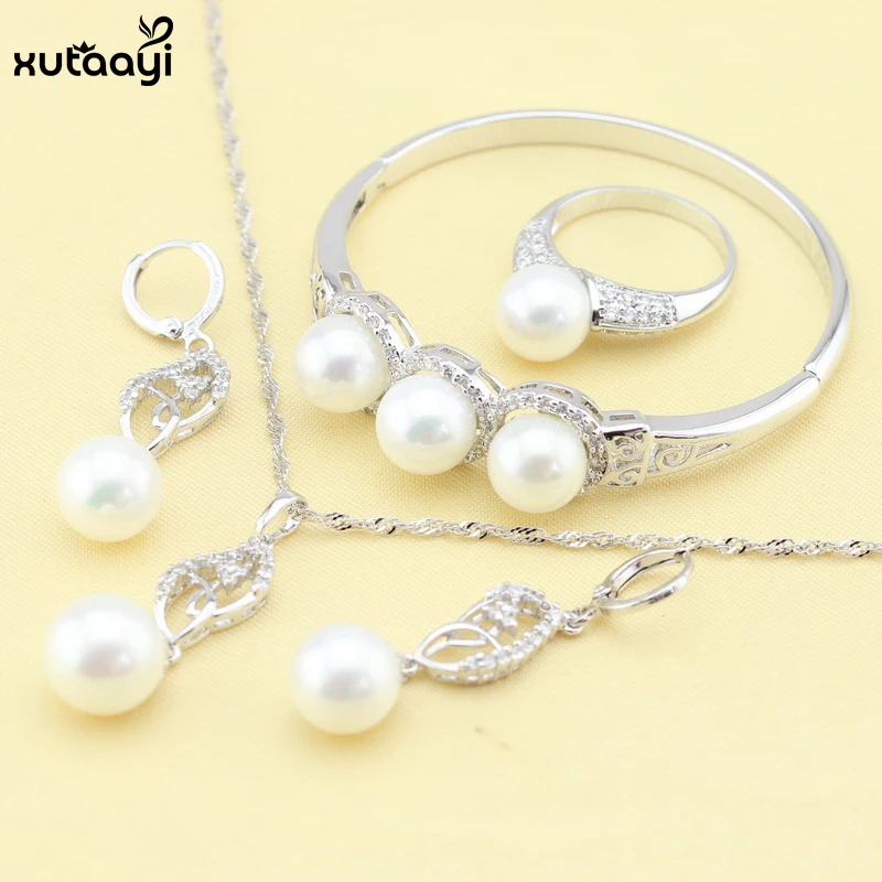 

XUTAAYI 4PCS Imitation Pearl Jewelry Set, White Crystal Fancy 925 Silver Overlay Necklace/Bracelets/ Earrings/Rings/ For Woman