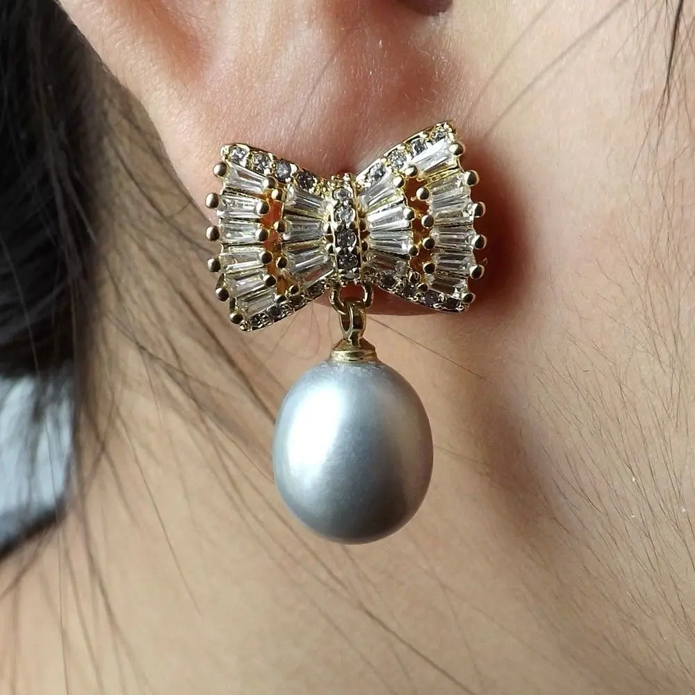 

Gray Rice Pearl Bow CZ Earrings