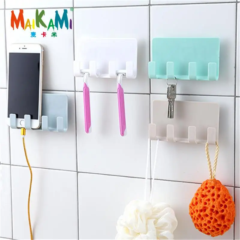 

1Pcs Home Office Wall Powerful Adhesive Plastic Power Plug Socket Holder Hanger Wall Storage Hook High Quality Four Colour