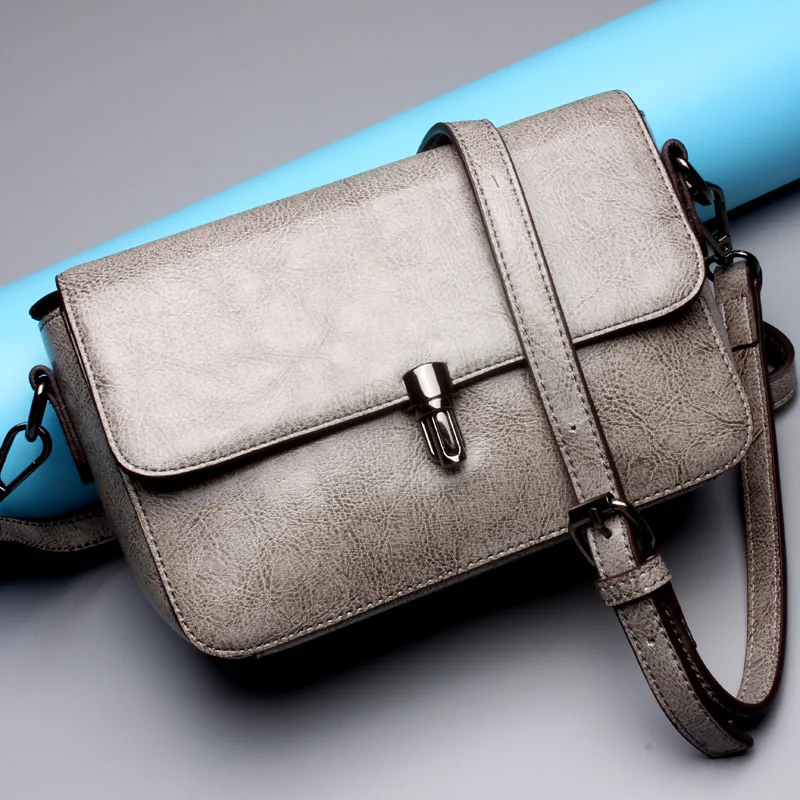 Ms. Korean version of the new leather buckle small square package Ms. leather version of the square leather shoulder crossed bag