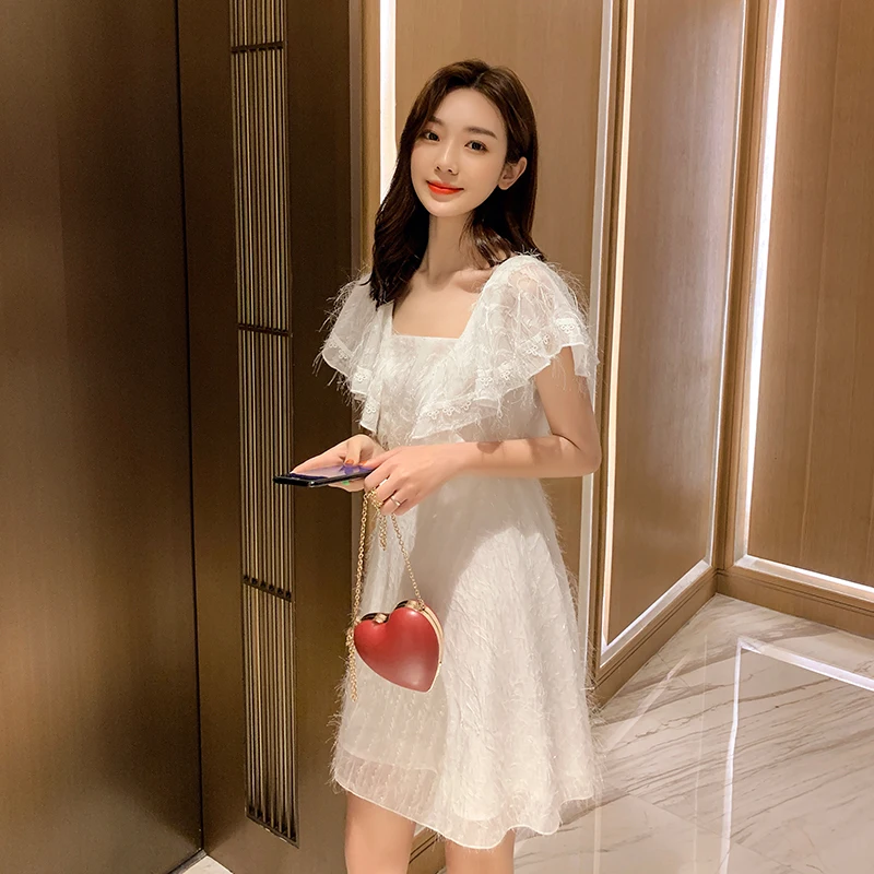 EAD French Style Square Collar Ladies Vintage Summer Dresses White Tassel Backless Women Elegant Dress New a Line Mini Sexy Robe EAD French Style Square Collar Ladies Vintage Summer Dresses White Tassel Backless Women Elegant Dress New a Line Mini Sexy Robe