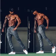 Men Gyms Long pants Cotton Men’s gasp workout fitness Pants casual Fashion sweatpants jogger pant skinny trousers Hip Hop