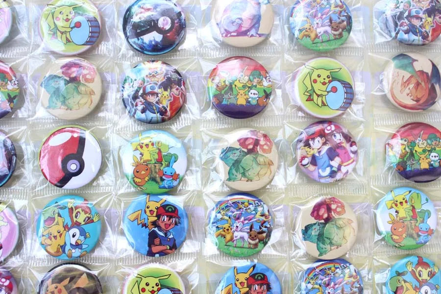 

N Hot 108pcs cartoon Pokemon logo 30mm DIY Pin Badge Button Cover Parts Supplies for Pro Maker Machine