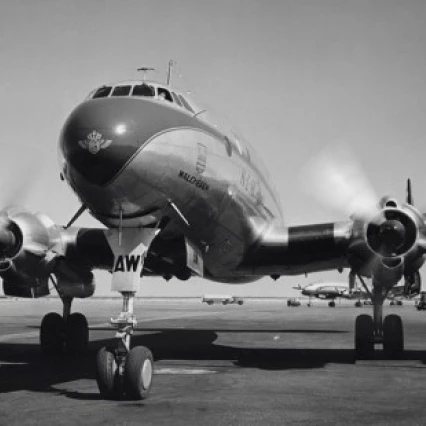 Low angle view of an airplane on a runway Poster Print (18 x 24)