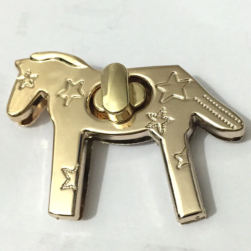 Candado de caballo dorado para monedero, cierre de giro de oro, cierre mano, reloj de giro AliExpress Maletas y bolsas