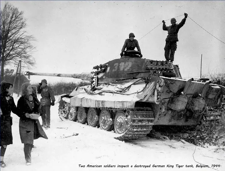 Two-American-soldiers-inspect-a-destroyed-German-King-Tiger-tank,-Belgium,-1944.