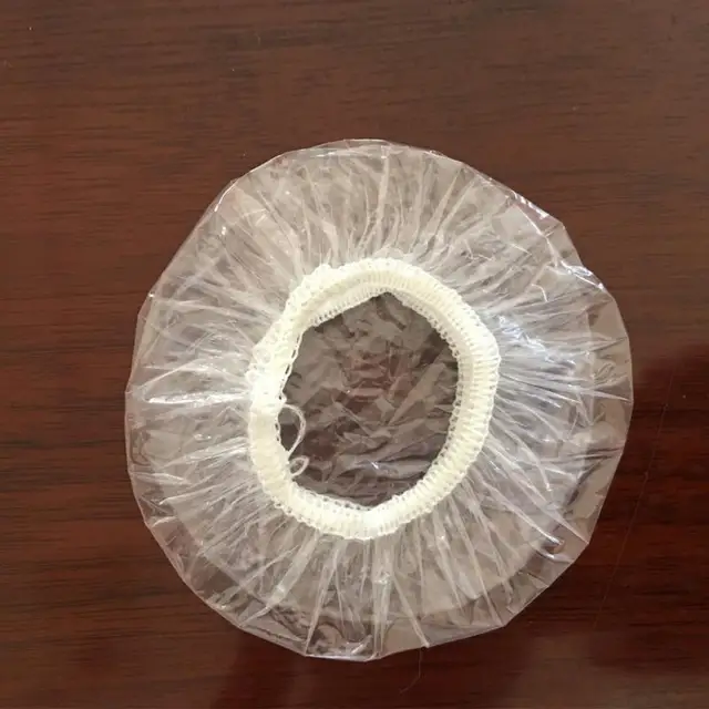100pcs/pack Earcaps Disposable Polyethylene Ear Covers Shield Protect Tint Clip Dye hair Waterproof earmuffs