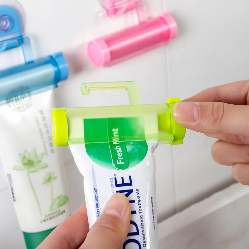 New Toothpaste Rolling Squeezer Dispenser Tube Partner Sucker Hanging Holder DS 