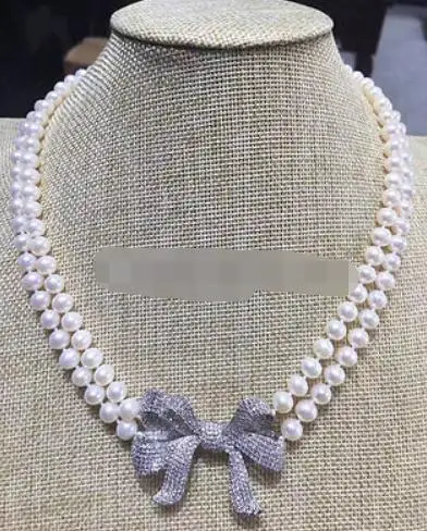 

P7526 - 2row 19-20" 8-9mm white round freshwater pearl necklace - zircon bowknot