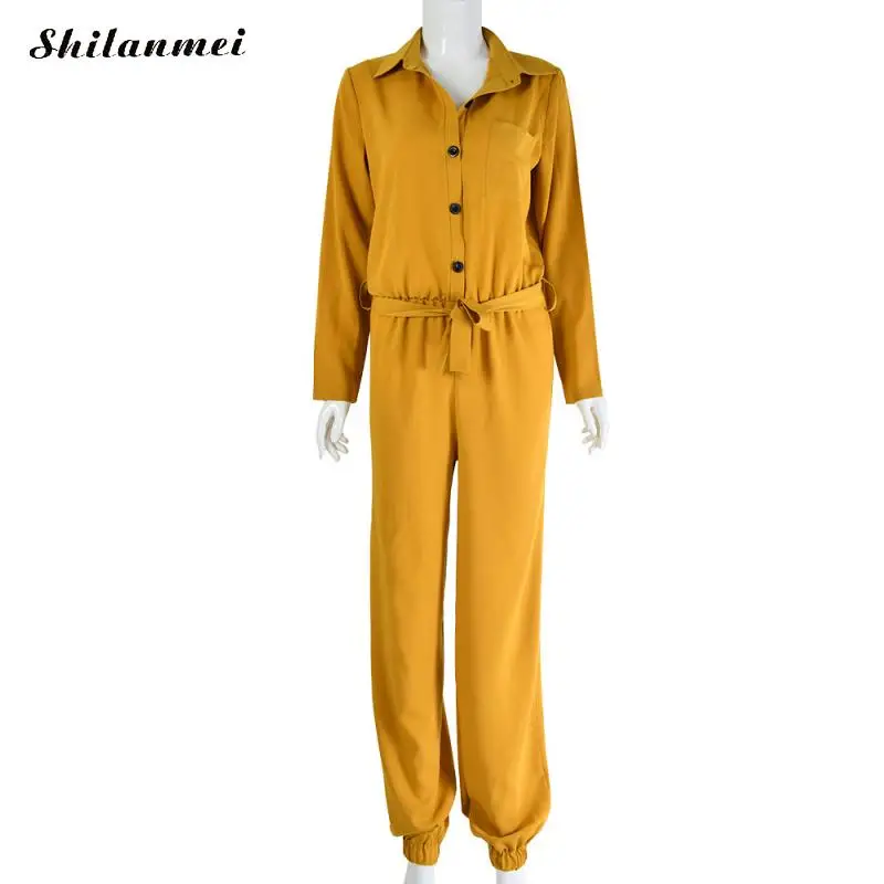 Mono elegante amarillo de manga larga con botón frontal con cinturón