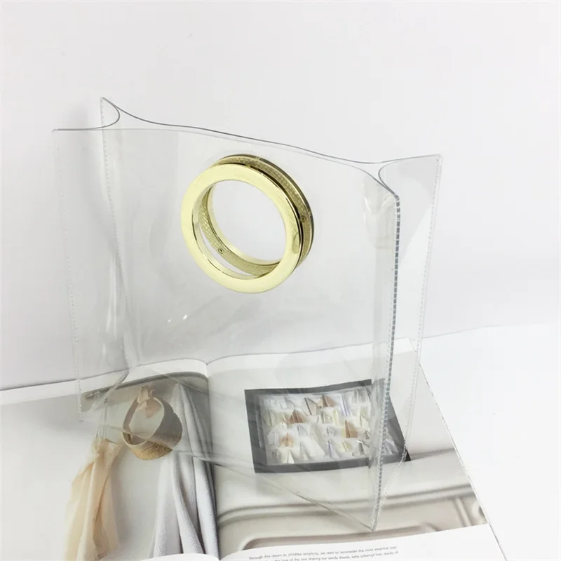 2018 Summer Hot Sale Fashion Transparent Plastic Women's Tote Laser Metal ring Handbag Lady Trend Beach Bag PVC Jelly Clear Bag metal ring tassels colour block tote bag