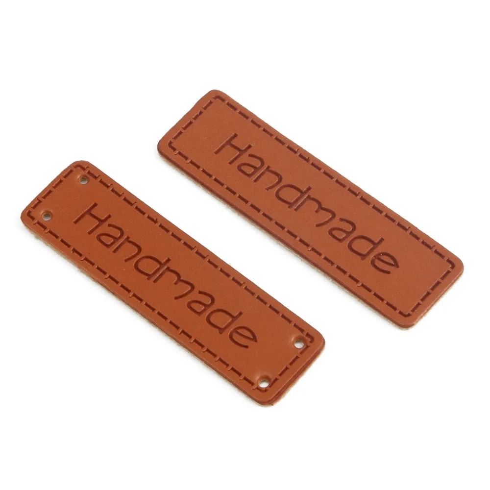 

Hot Sale 50PCS/Lot Handmade Labels Leather Tags for DIY Craft Gift Clothes Garment Jeans Bags Shoes Sewing Accessories Free Ship