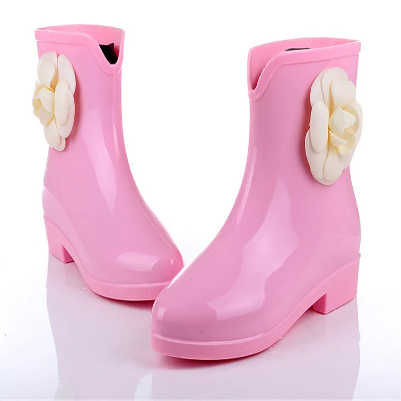 black and pink rain boots