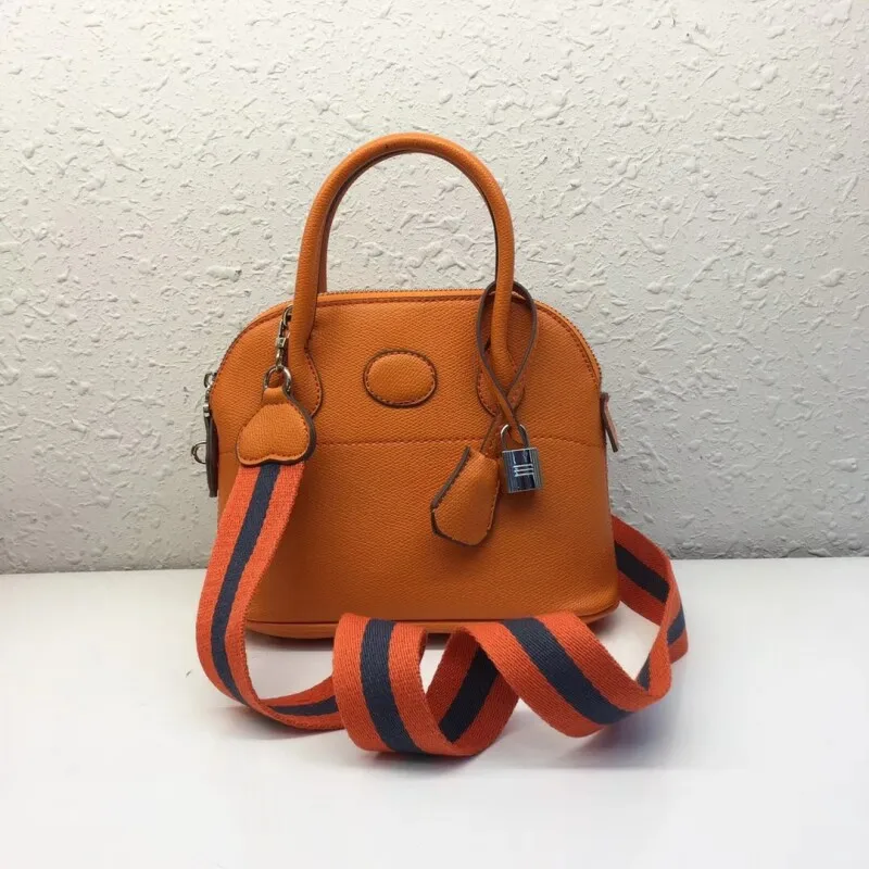 

2018 Real Soft Bolsos Mujer High Quality Pu Leather Wild New Large Capacity Simple Shell Female Bag Wide Shoulder Strap Handbag