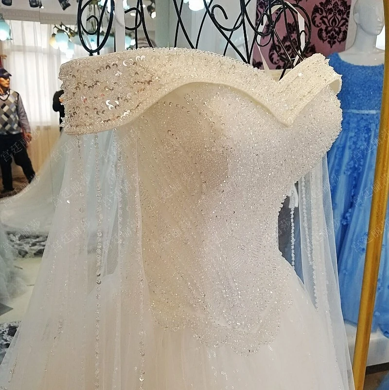 Billig 2019 luxus Kristall Dubai Kaftan Hochzeit Kleider Sexy v ausschnitt robe de mariage Langarm Arabisch Muslim Brautkleider
