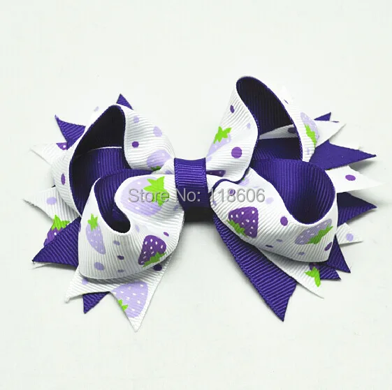 Blue Strawberry boutique kids hair bow.jpg