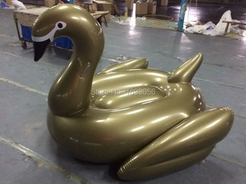 gold swan float