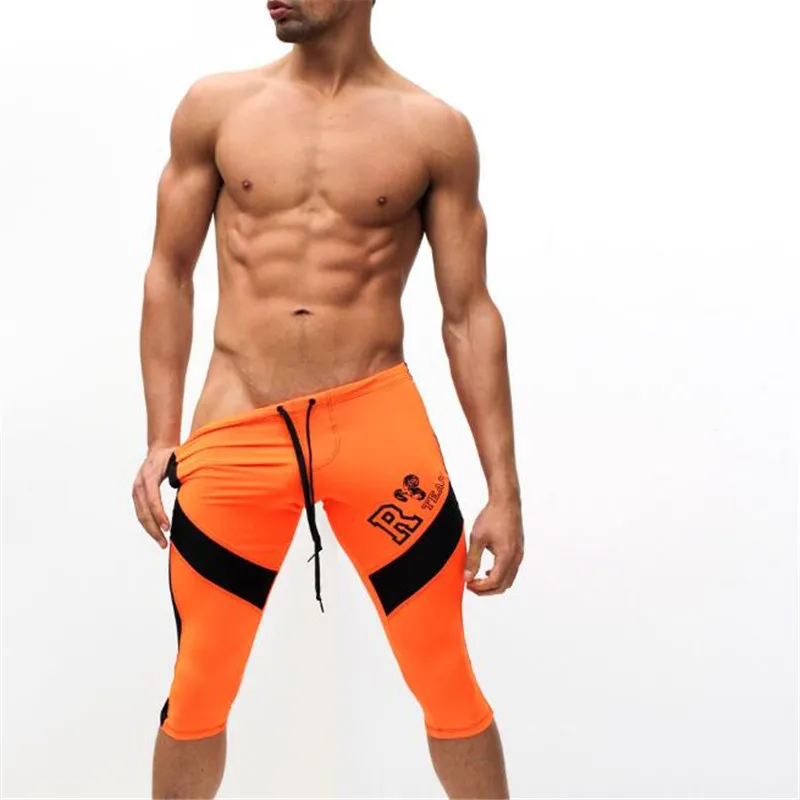 Мужские пляжные шорты, мужские шорты с эластичной талией, мужские высококачественные сексуальные шорты с низкой талией - Цвет: Оранжевый