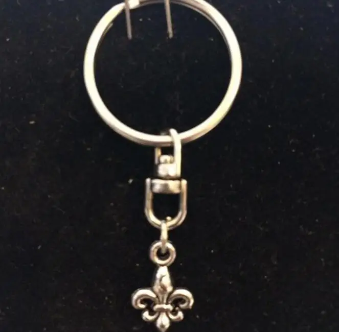 

Fleur de lis Charms Rotating Keychain Vintage Silver fleur-de-lis Pendant Trace Chains Key Chain DIY Jewelry 50Pcs Free