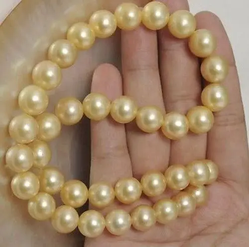 

Free Shipping >> HUGE 18" AAA+ 10-11MM ROUND SOUTH SEA GOLDEN PEARL NECKLACE 14K GOLD CLASP