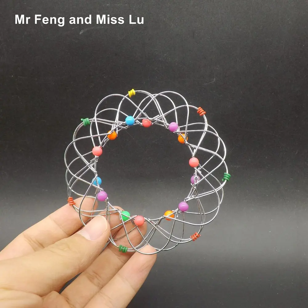 

Flower Metal Ring Puzzle IQ Brain Teaser Test Toy Kid Gift Mind Game Magic Trick Iron Gadget