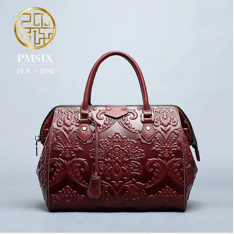 

2017 Pmsix new China embossed leather handbag first layer of leather Messenger bag fashion retro women bag