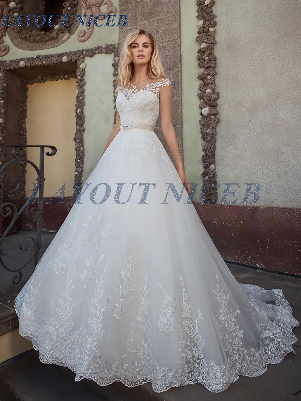 

Vestidos de Noiva A Line Lace Wedding Dress 2018 See Through Back Wedding Gowns Cap Sleeves Robe De Mariage Belt Bridal Gowns