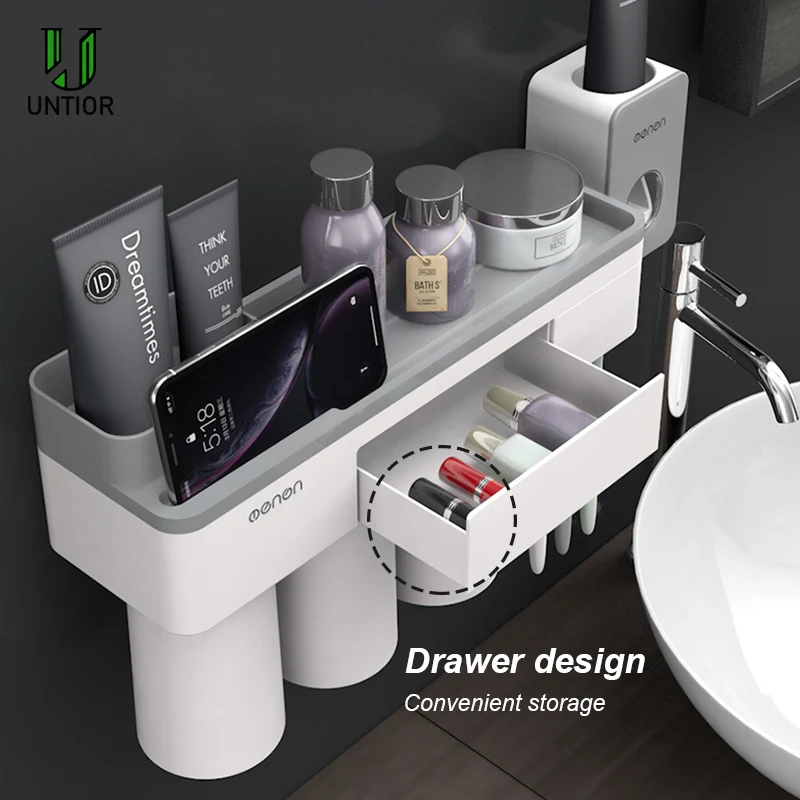 Online UNITOR de plástico montado en la Pared Soporte de cepillo de dientes dispensador automático de pasta de dientes artículos de tocador estante de almacenamiento accesorios de baño conjunto