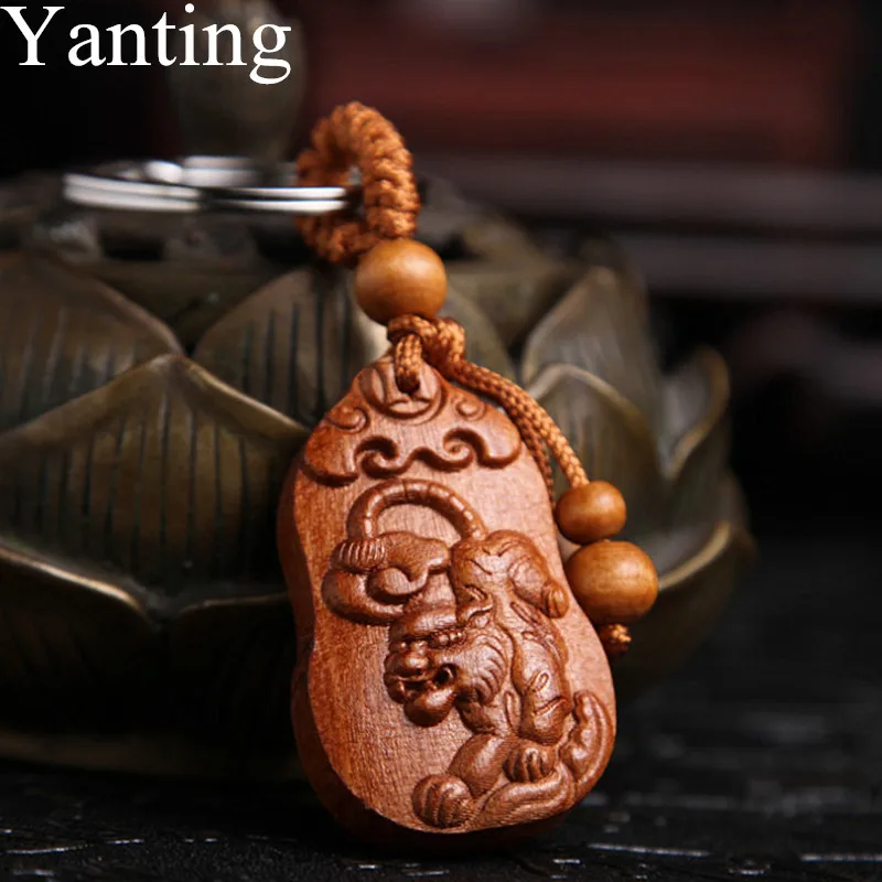 

Yanting Wood Key Chains Hanging Pendant Car Key Chain Peach Wood Tiger Keychain Symbol Of Strength Rights Glory Men Jewelry 0119
